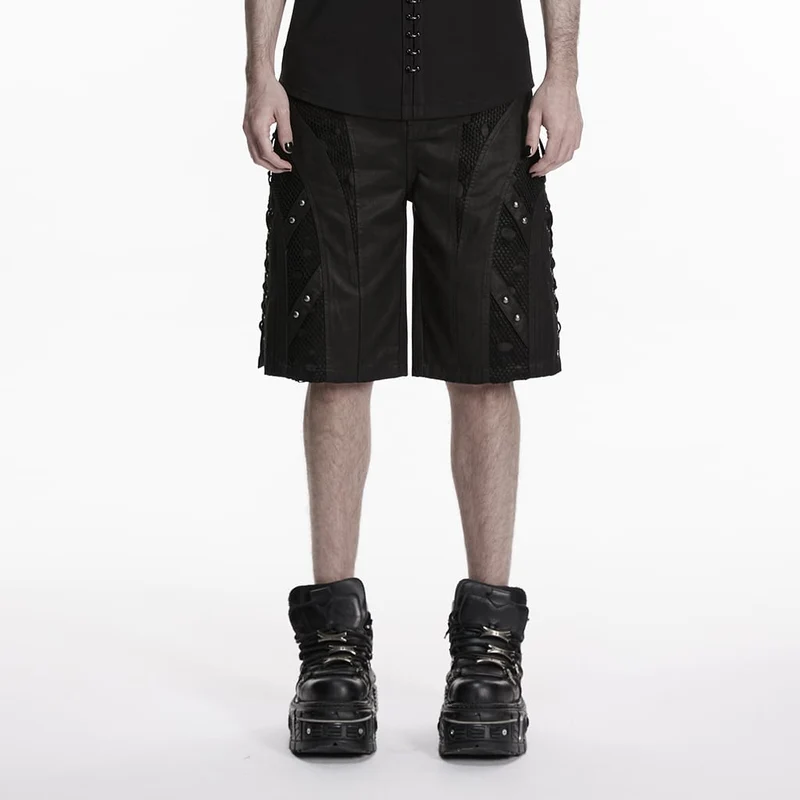 Herrshorts med nitar och minimalistiska punkmönster
