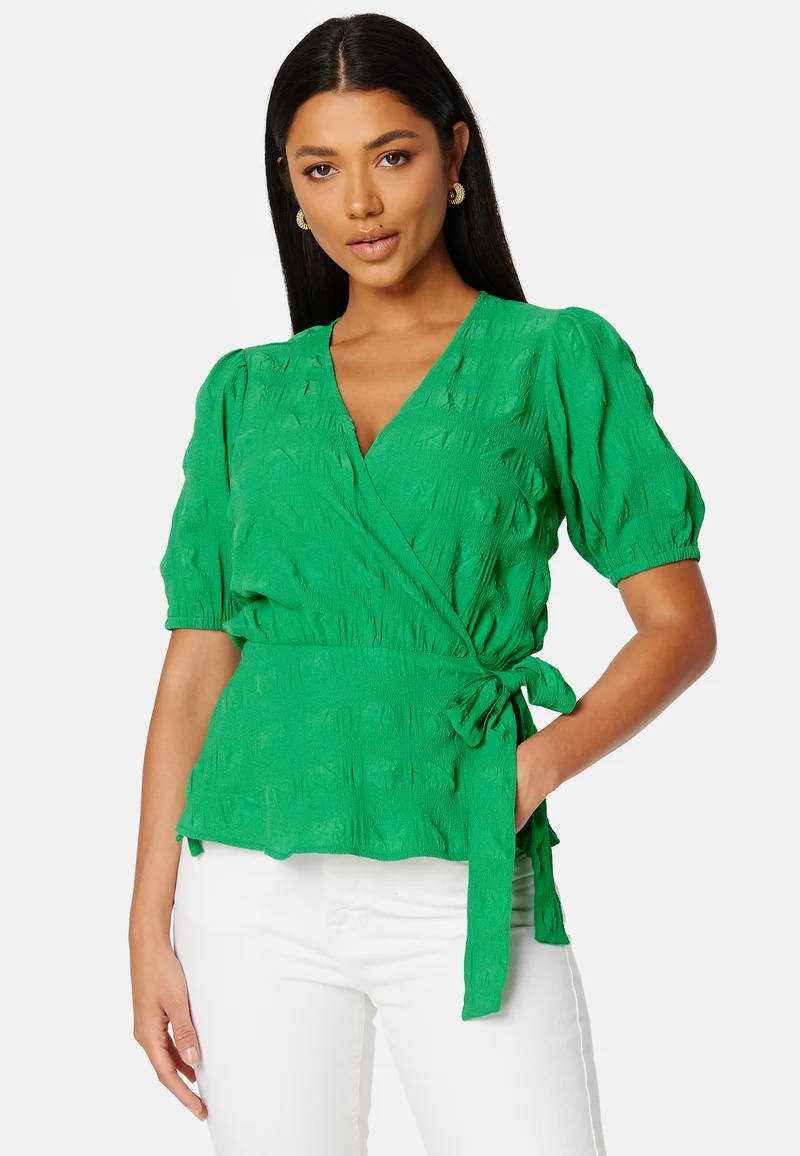 Triniti ss wrap blouse