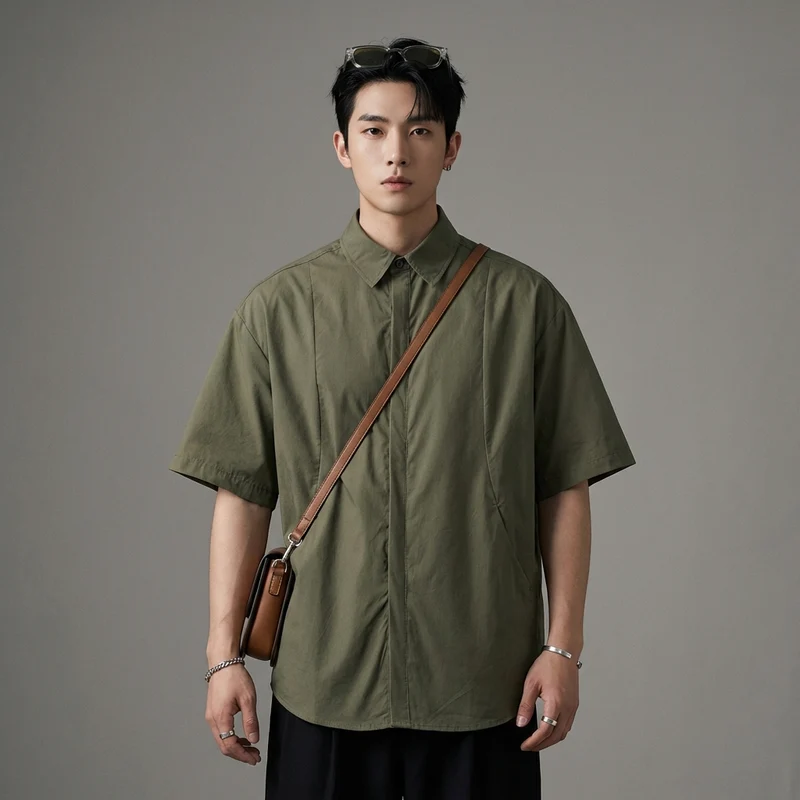 Solid color structure curved pressed line pocket loose short sleeved shirt