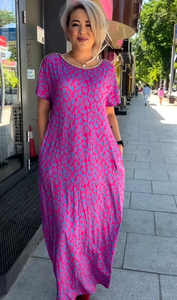 Icone™ LeopardMaxi: Bekväm Elegant Flödande Leopardmönstrad Maxiklänning