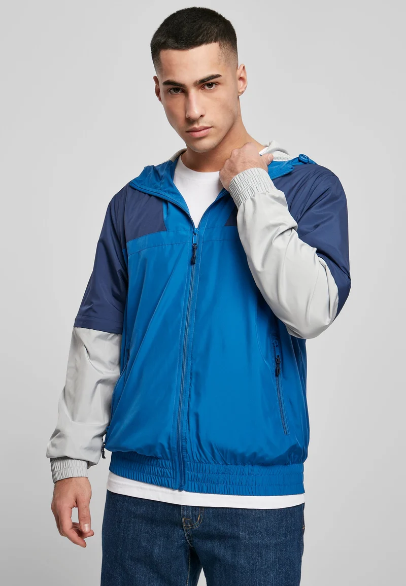 UC Zip Away Track Jacket